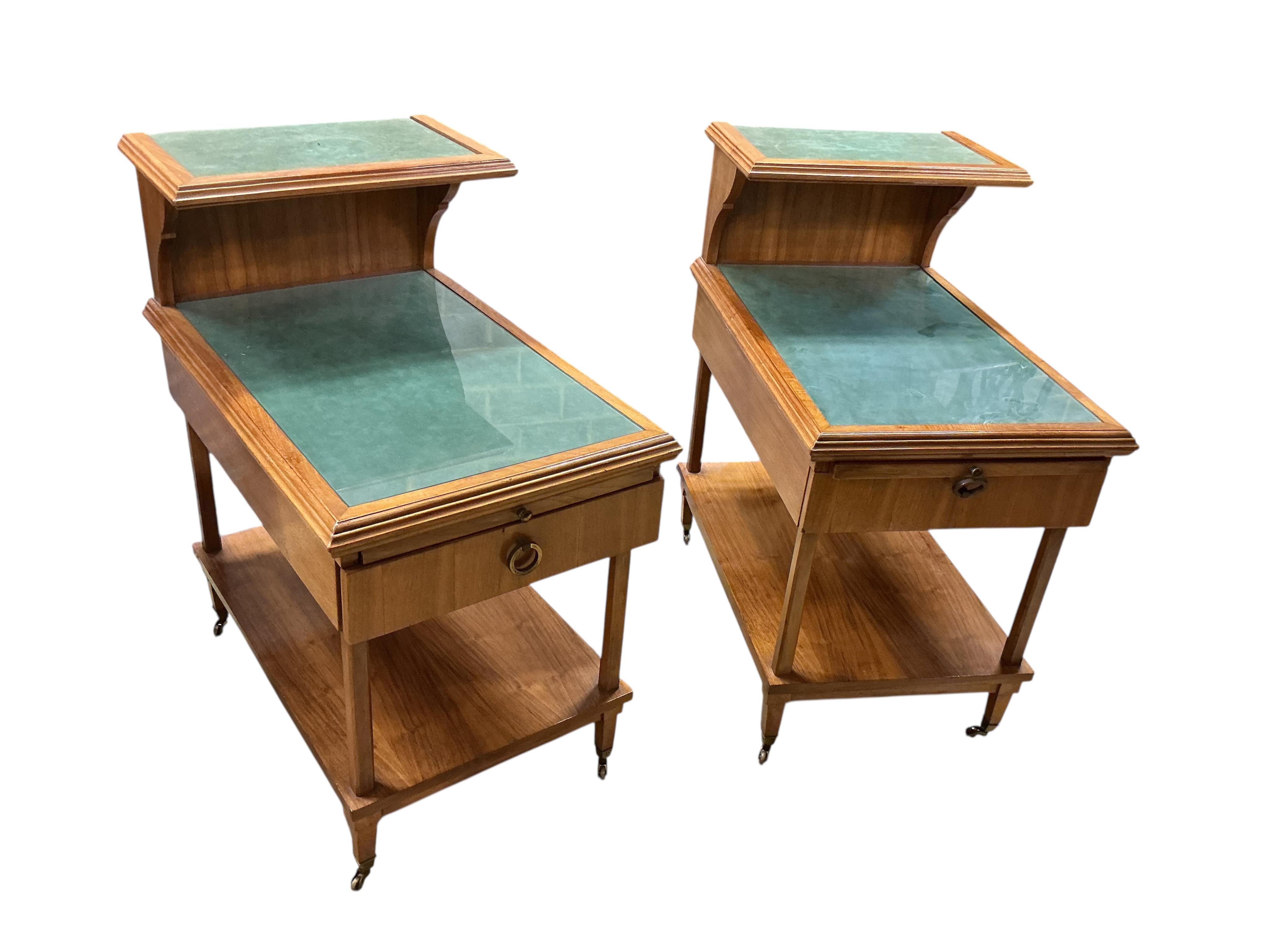 A pair of mid 20th century walnut bedside tables, width 46cm, depth 69cm, height 82cm